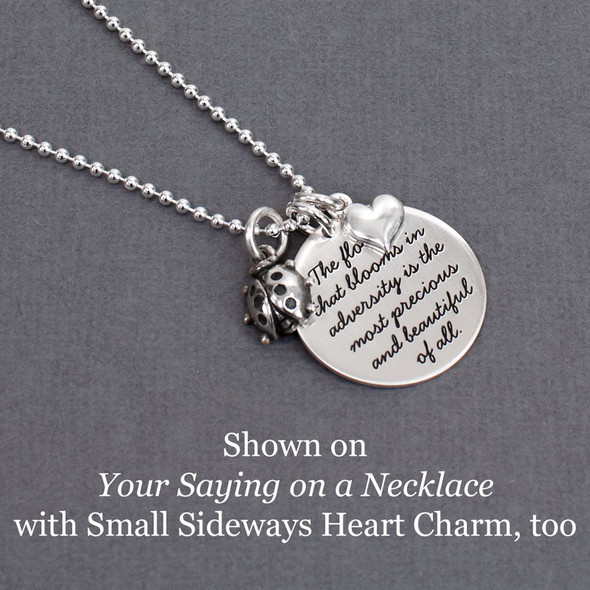 Ladybug charm shown in use on our "Your Saying on a Necklace" product, along with our silver Small Sideways Heart Charm