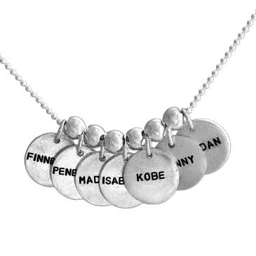 5/8" Thai Fine Silver Name Discs (Matte finish) with Block Font, personalized with hand stamped kids names on 7 charms, shown on white