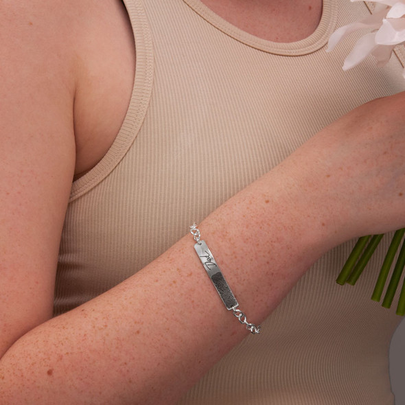 Custom Silver Fingerprint and handwriting ID Bracelet, personalized with your loved one's actual fingerprint and handwriting, shown on model