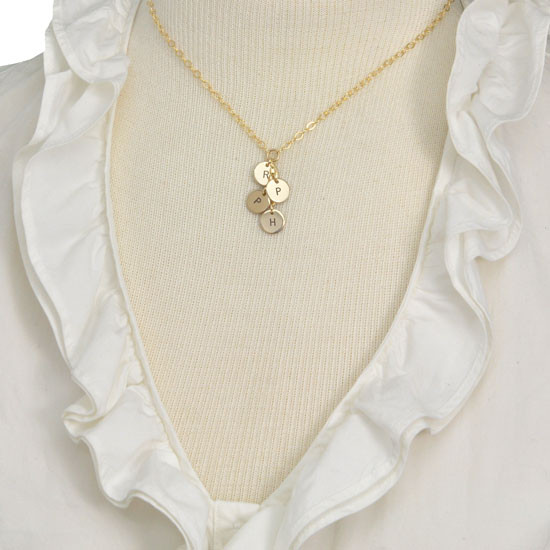 Gold cascading initial necklace