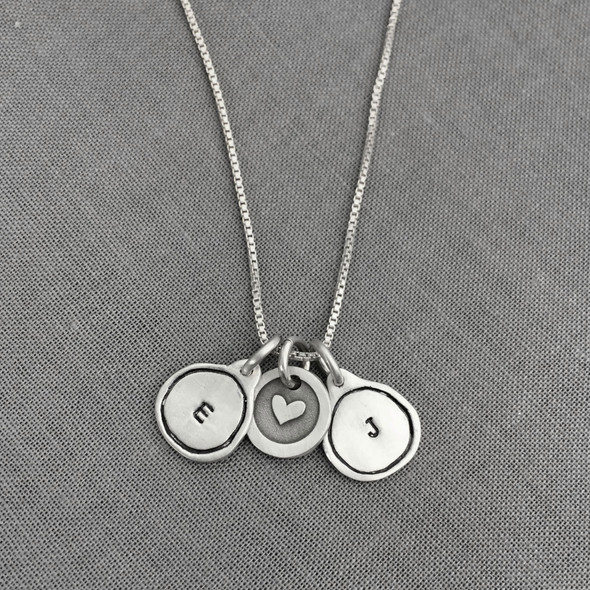 Tiny Framed Initial Charm Necklace made of fine silver