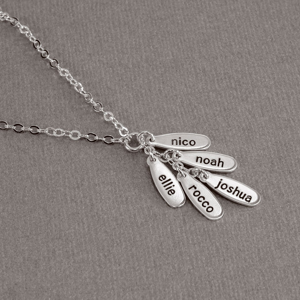 Custom Silver Cascade Necklace, hand stamped with the kids' names, shown from the top