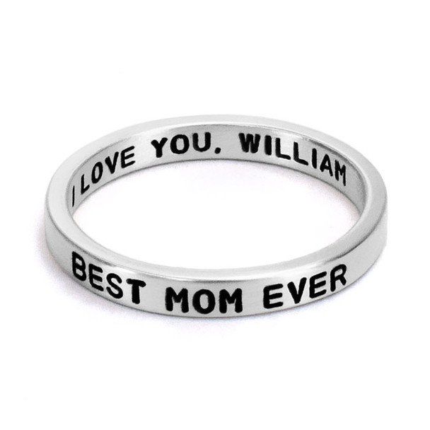 Mother's Day gift hand stamped sterling silver stackable ring, personalized with son's note to Mom, shown close up on white