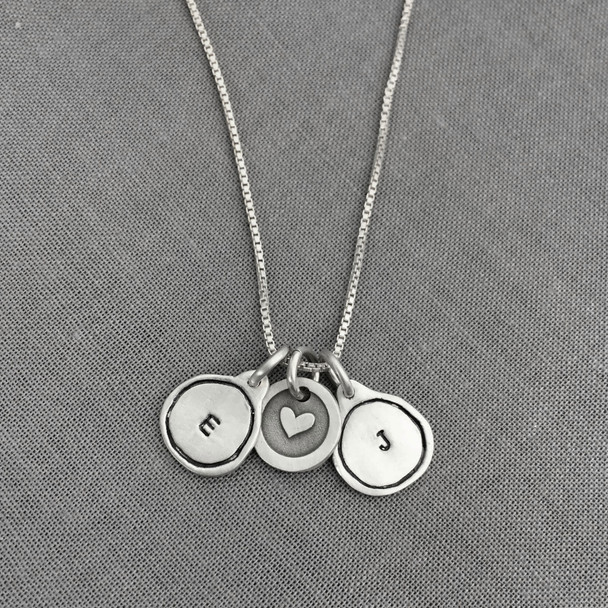 Tiny Framed Initial Charm Necklace made of fine silver