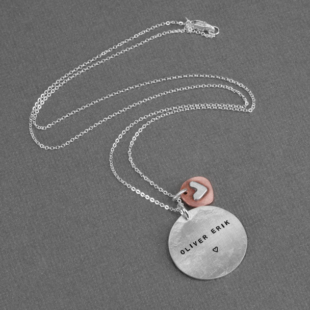 Silver hand stamped necklace with name, with a copper and silver heart