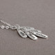 Personalized Silver Cascade Necklace, hand stamped with the kids' names, shown from the side