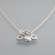 Hand Stamped fine silver Loved Tiny Initials Necklace, side view