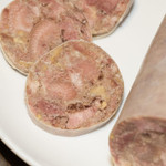 Schwartenmagen Head Cheese - 14oz, sliced traditional German-style pork head cheese made from natural ingredients.