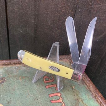 Yellow Synthetic Smooth Mini Trapper. - Carbon Steel