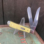 Yellow Synthetic Smooth Mini Trapper. - Carbon Steel