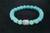 Turquoise Howlite with head and metal inlays Bracelet