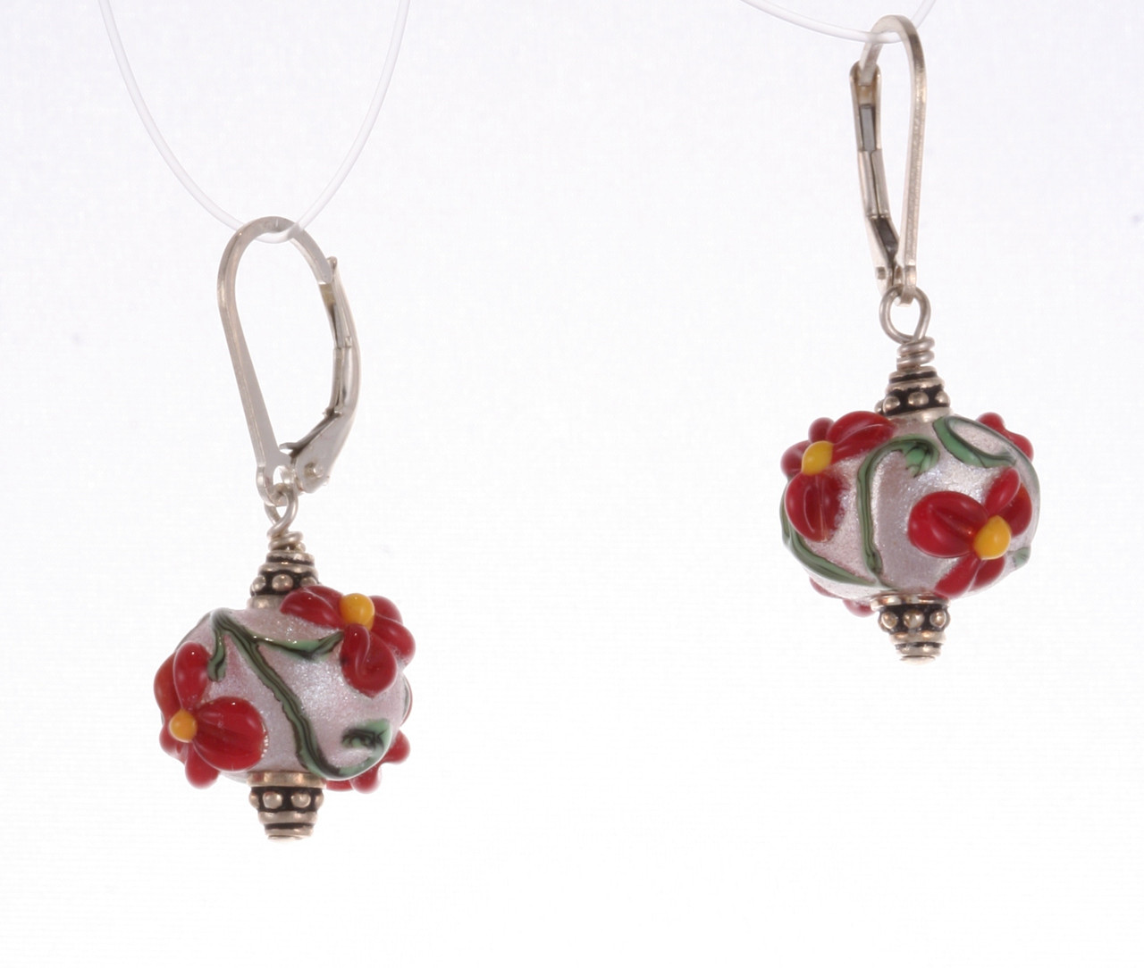 Red Flowers With Spherical White Sparkle Background Carnelian Knoll