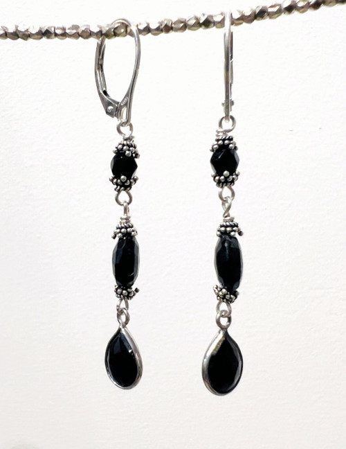 Triple black faceted drop earrings