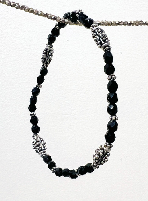 Black Czechoslovakian glass and silver stretchy bracelet