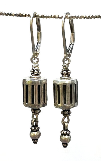Cylindrical bird cage earrings with silver drops