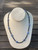 Faceted onyx and sponge coral necklace