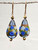 Periwinkle swirled roses on  gold foil flattened tear drop Venetian glass earrings