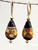 Black flattened tear drop Venetian glass earrings with ochre and maroon roses
