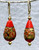 Tomato red flattened tear drop Venetian glass earrings with coral roses