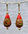 Tomato red flattened tear drop Venetian glass earrings with coral roses