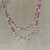 The "Small Pink Ruby and Silver Fan" necklace is shown above the "Medium Pink Ruby and Silver Fan" neckalce. Each is sold seperately.