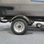 ST145/R12 Loadstar Trailer Tire LRE on 5 Bolt Silver Mod HD Wheel