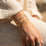 TWISTED HAMMERED CUFF GOLD BRACELET