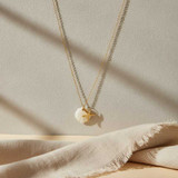 NAUTICAL GOLD PLATED SEASHELL AND STARFISH CHARM NECKLACE