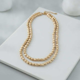 DOUBLE-STRAND MATTE GOLD HAMMERED BEAD STATEMENT NECKLACE