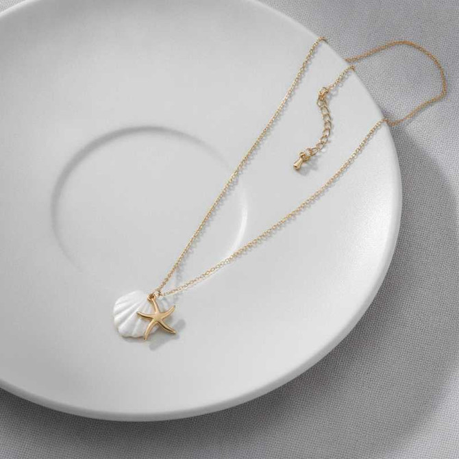 NAUTICAL GOLD PLATED SEASHELL AND STARFISH CHARM NECKLACE