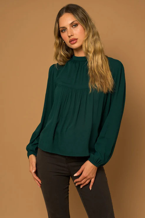 MOCK NECK BACK BUTTON DOWN LONG SLEEVE TOP
