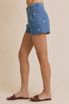 FLORAL EMBROIDERED PLEATED DENIM SHORTS