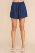 WASHED DENIM HIGH WAISTED TIE SHORTS