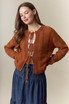 HOLE STRIPE BOWS FRONT TIE CARDIGAN