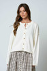 RAW EDGE EXPOSED SEAM BUTTON CARDIGAN