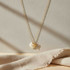 NAUTICAL GOLD PLATED SEASHELL AND STARFISH CHARM NECKLACE