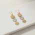 GOLD AND SILVER THREE TIERED FLORAL DANGLE EARRINGS