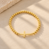 CROSS BEADED STRETCH BRACELET