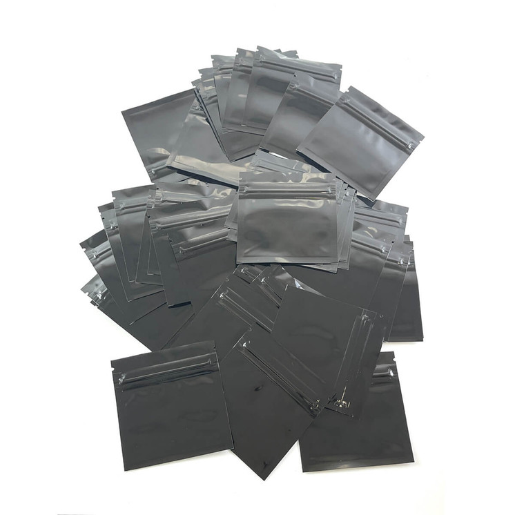 MYLAR BAGGIES - BLACK-CLEAR - 3" INCHES x 3" INCHES - 1/2 GRAM - 50 PER PACK