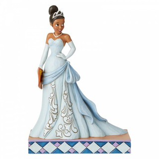 Disney Traditions Tiana from Princess and the frog stands holding a menu for her new restaurant Figurine