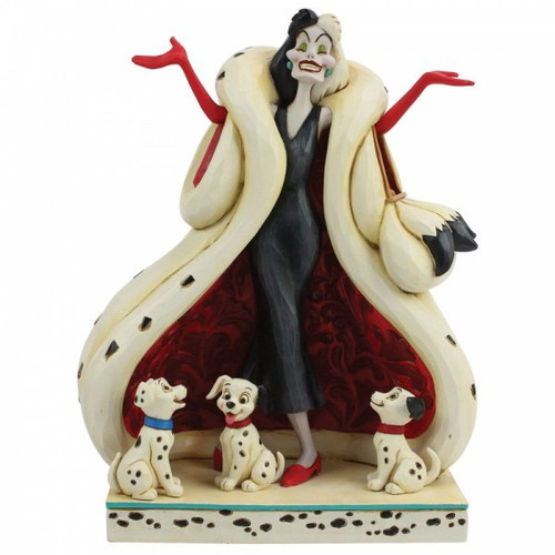 Disney Traditions Cruella de Vil with three Dalmatians under her figurine
