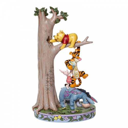 Disney Traditions Eeyore, Piglet & Tigger help Winnie the Pooh get honey from a tree Figurine