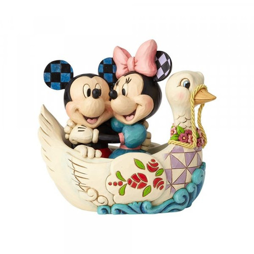 Disney Traditions Mickey and Minnie ride on a swan boat figurine