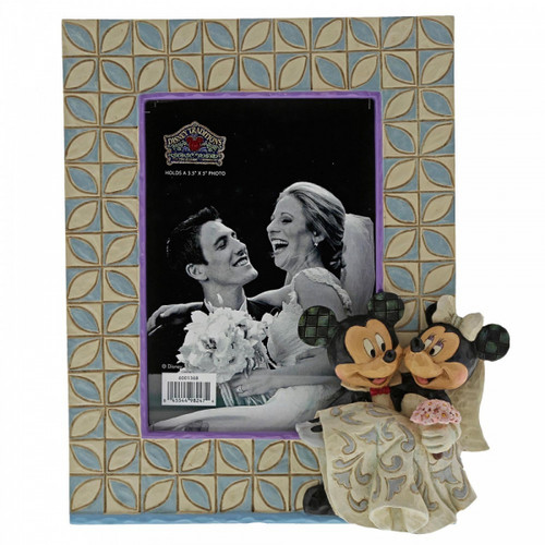 Disney Traditions photo frame with Mickey carrying Minnie both in their wedding outfits figurine