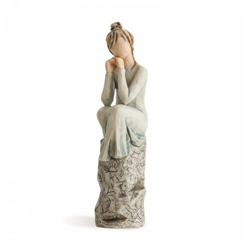 Willow Tree Figurine depicting a girl sitting on a rock and leaning on her hands