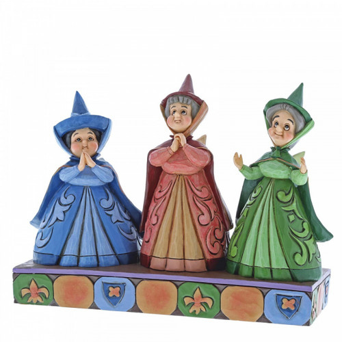 Disney Traditions The three fairies from Sleeping Beauty stand in a row figurine