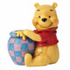 Disney Traditions Winnie the pooh sitting with his 'hunny' pot mini figurine