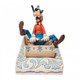 Disney Traditions Goofy Sledding Figurine