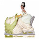 Disney Traditions Princess Tiana on lily pads while Louie serenades her with his trumpet figurine