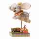 Disney Traditions Dumbo takes his first flight over the circus tents with the help of a magical feather Figurine